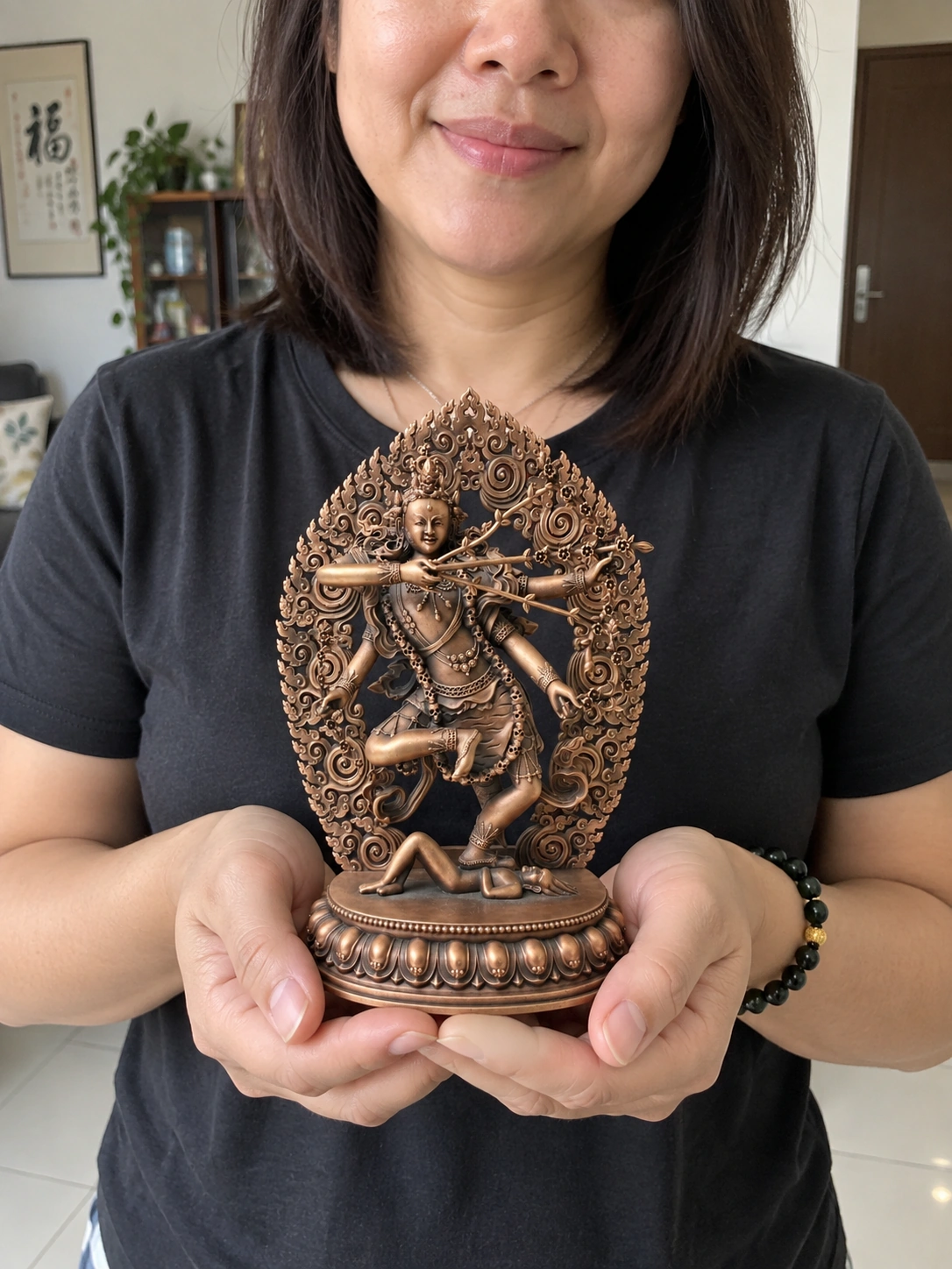 Kurukulle Red Tara Red-Copper Statue – Protection and Courage, 15 cm held in a Malaysian home
