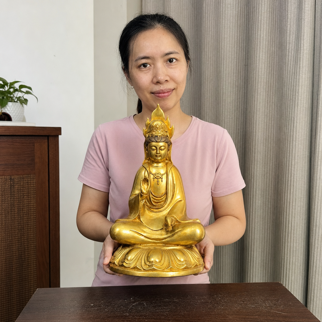 Guanyin statue shown with a person in a home setting