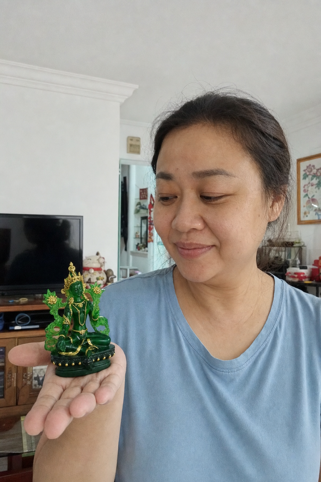 Green Tara Green Resin Statue – Protection & Courage 12.8 cm lifestyle image in a Malaysian Chinese home