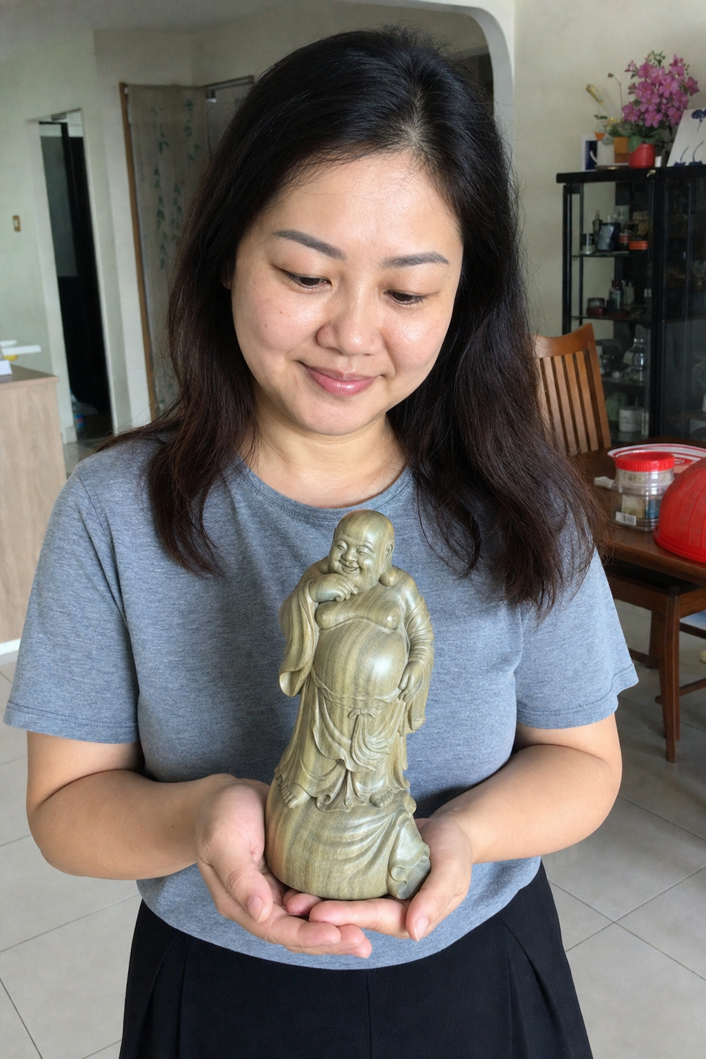 Green Sandalwood Happy Buddha – Wealth & Good Fortune lifestyle image in a Malaysian Chinese home