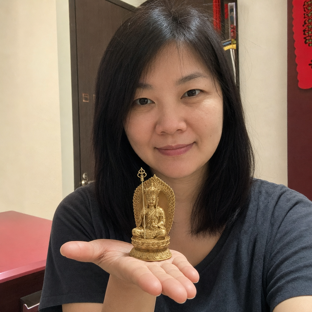 Ksitigarbha Bodhisattva gold-finish statue in a Malaysian Chinese home 10 cm